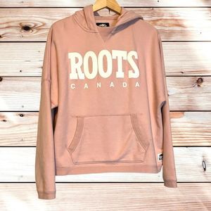 Root canada pullover/Hoodie in like new condition. Its more of a baby pink color